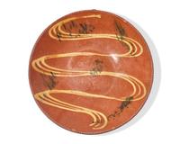 A Glazed and Slip-Decorated Redware Charger, Southeastern Pennsylvania, 19th Century