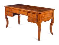 A Louis XV Provincial Walnut Bureau Plat
