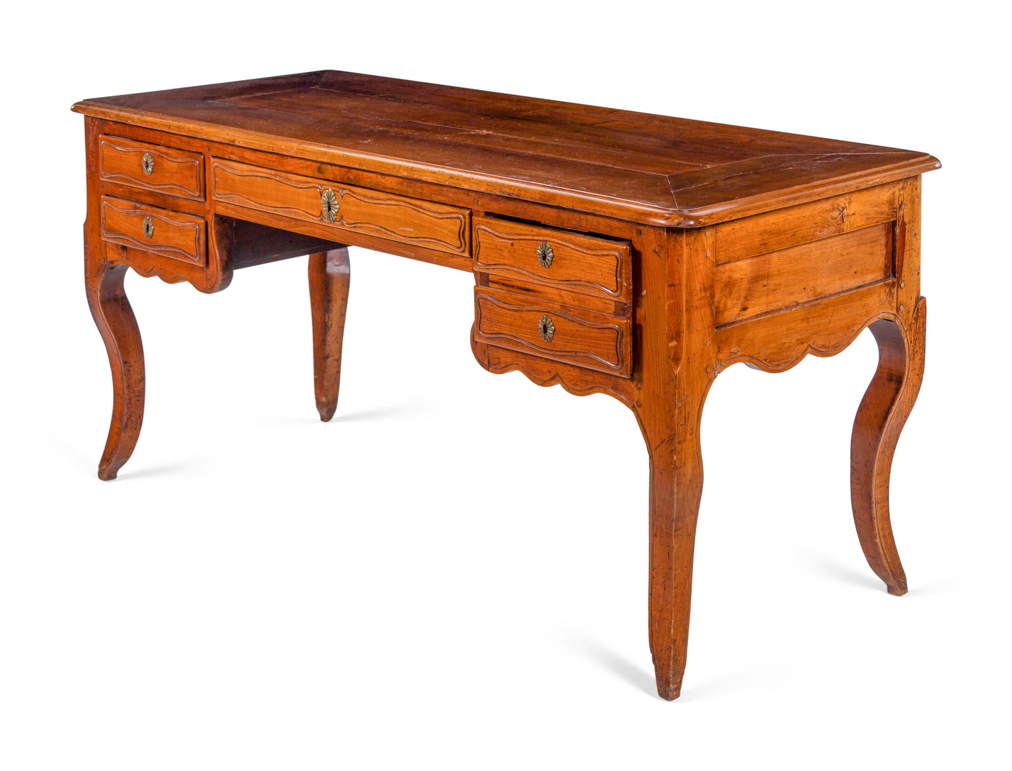 A Louis XV Provincial Walnut Bureau Plat