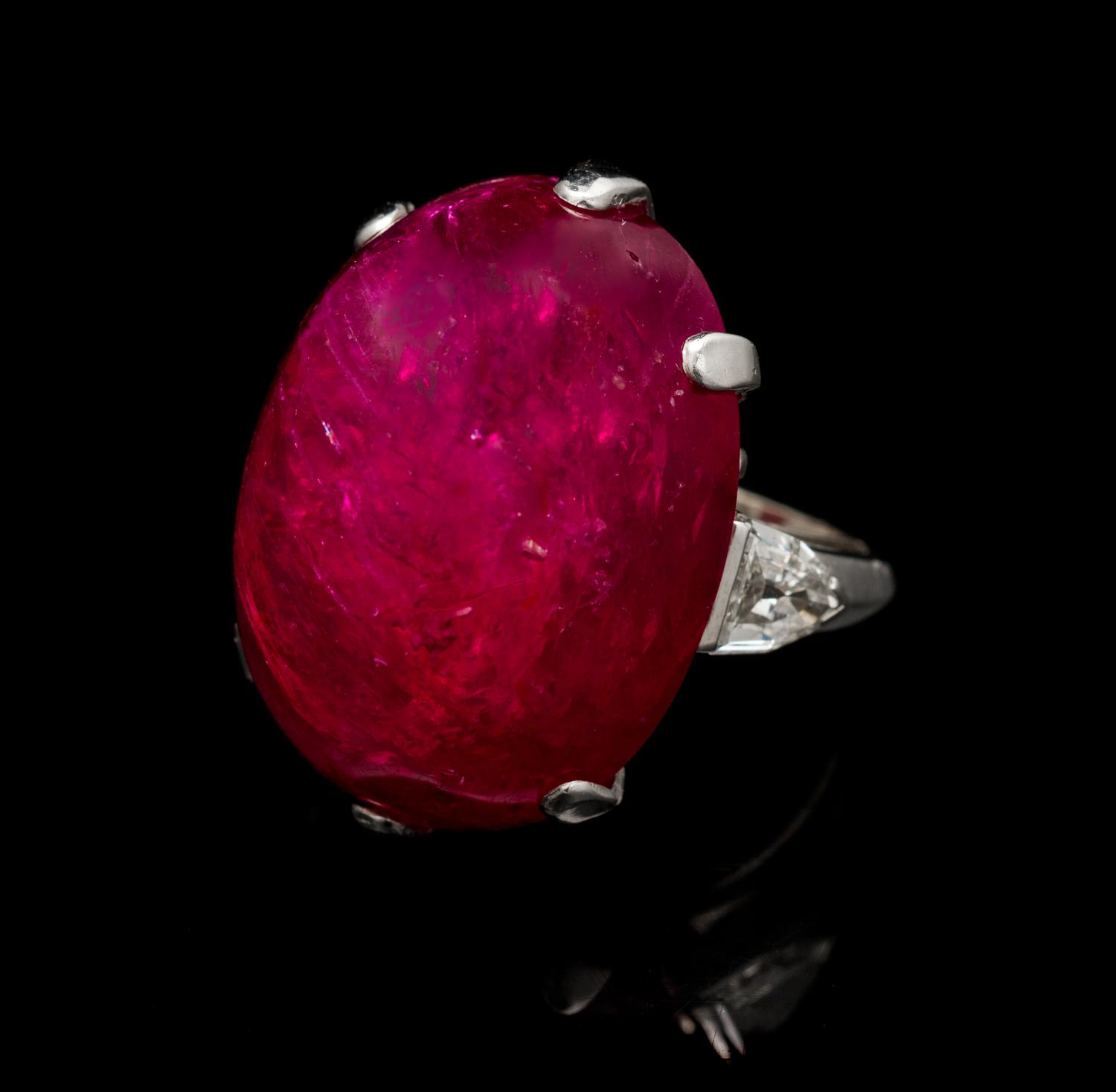 A Platinum, Ruby and Diamond Ring, Circa 1950, 16.70 dwts.