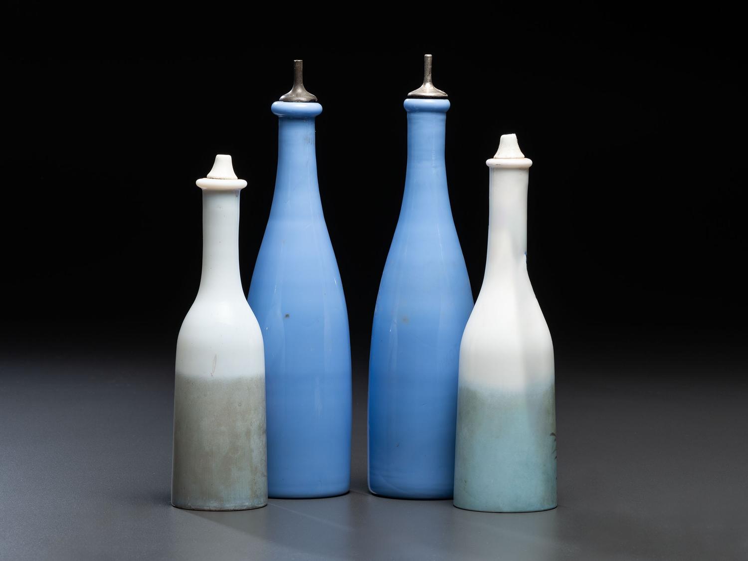Four Glass Barber Bottles