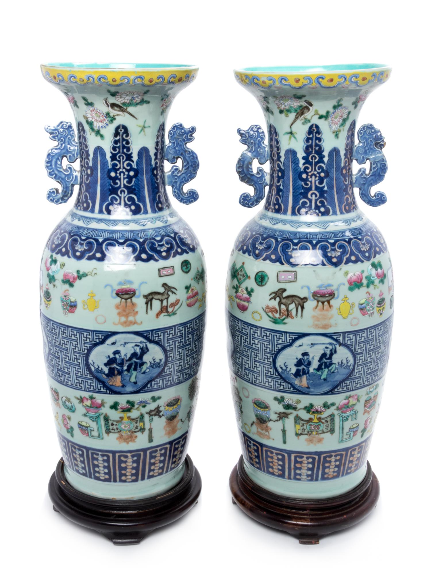 A Pair of Chinese Celadon Ground Underglazed Blue and Famille Rose Porcelain Vases Height 24 inches. — 19TH CENTURY