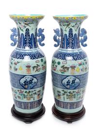 A Pair of Chinese Celadon Ground Underglazed Blue and Famille Rose Porcelain Vases Height 24 inches. — 19TH CENTURY