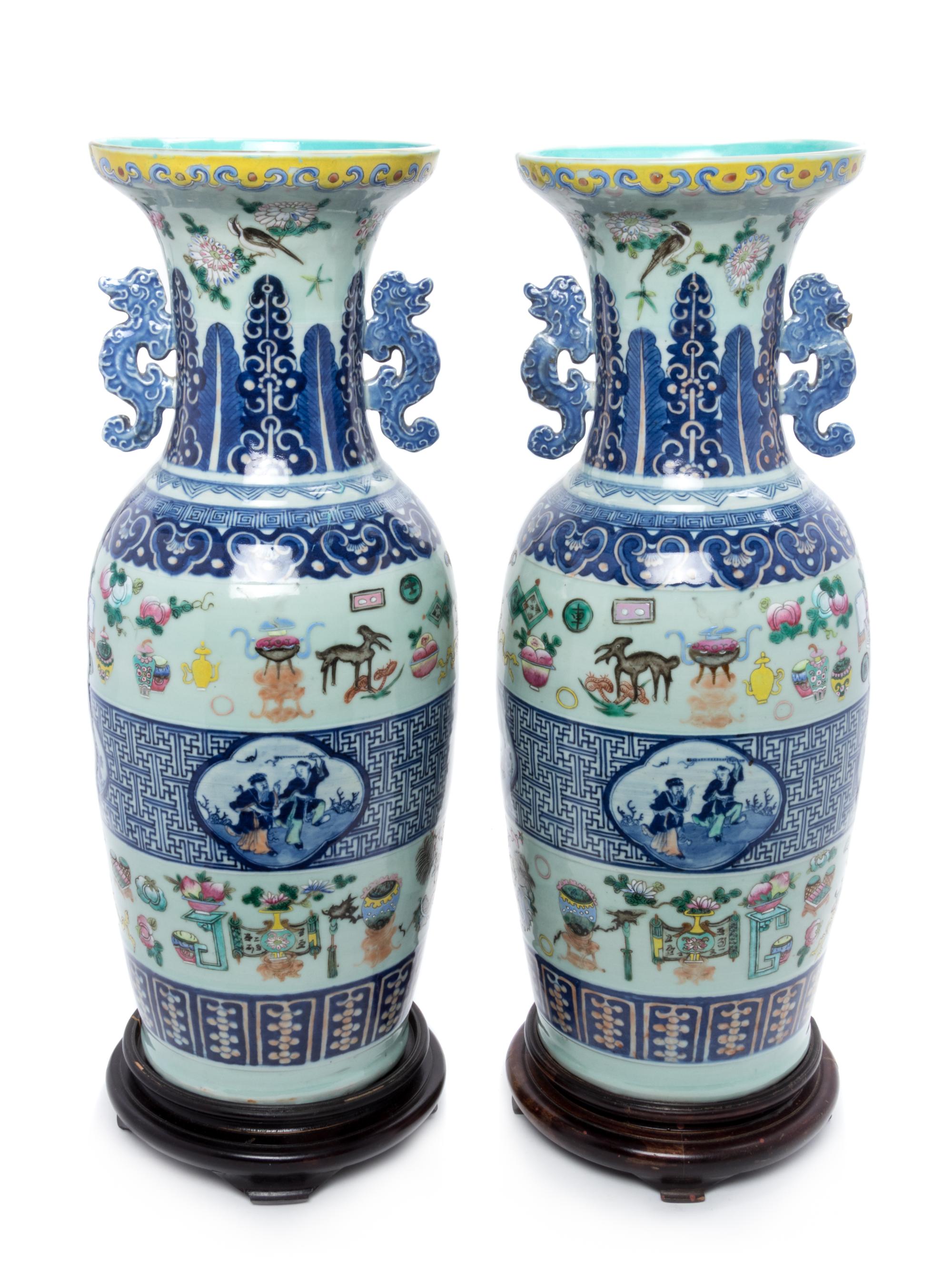 A Pair of Chinese Celadon Ground Underglazed Blue and Famille Rose Porcelain Vases Height 24 inches. — 19TH CENTURY