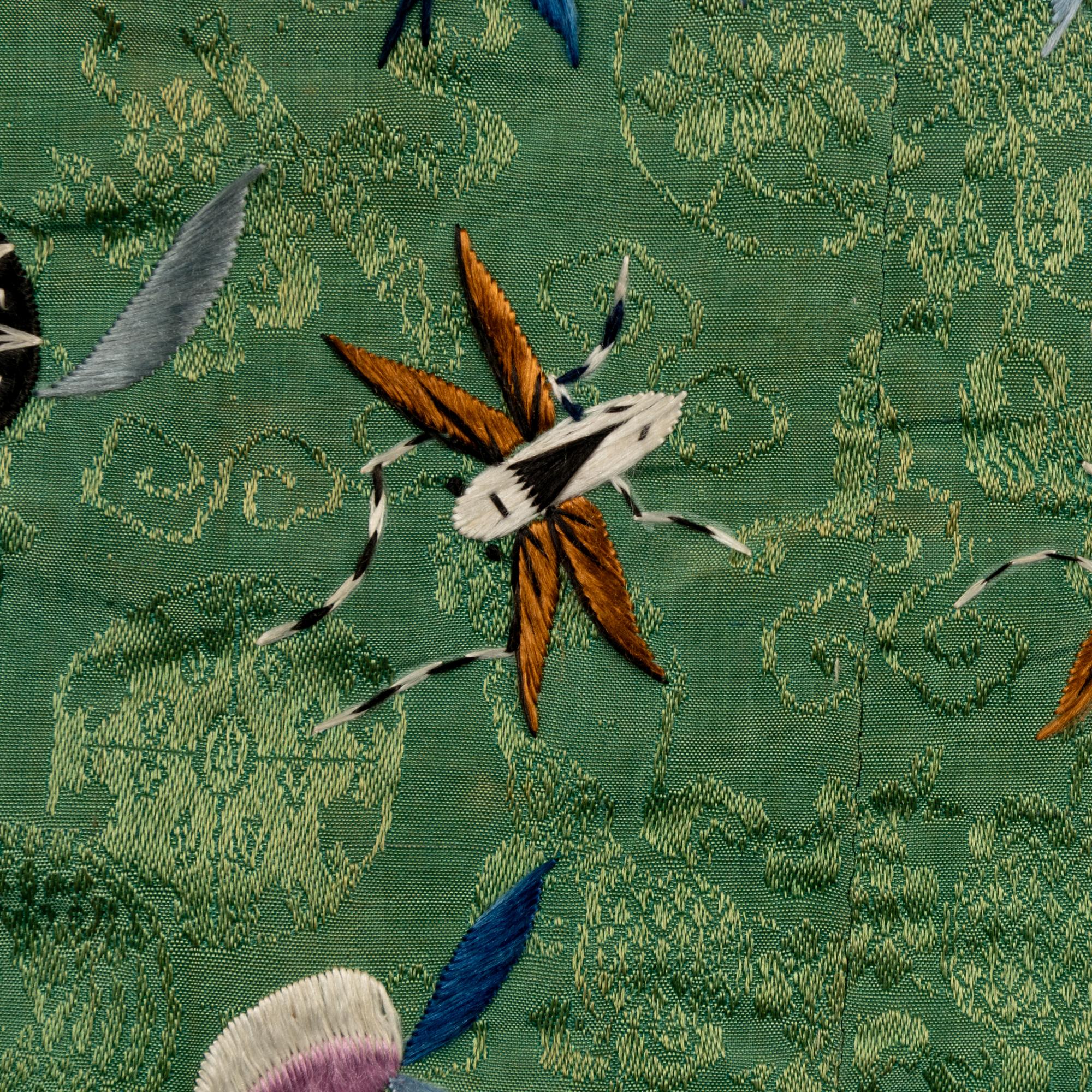 A Chinese Apple Green Ground Embroidered 'Peonies and Insects' Silk Lady's Robe, Changyi, 19th Century 清晚期 蘋果綠地綉牡丹草蟲氅衣