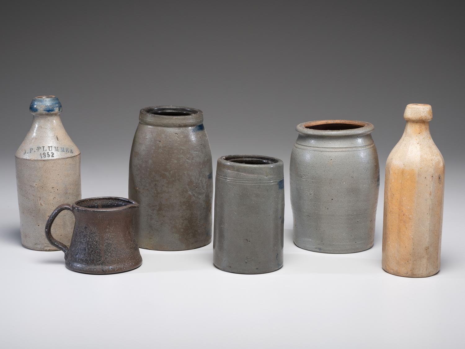 Five Stoneware Bottles and Canning Jars