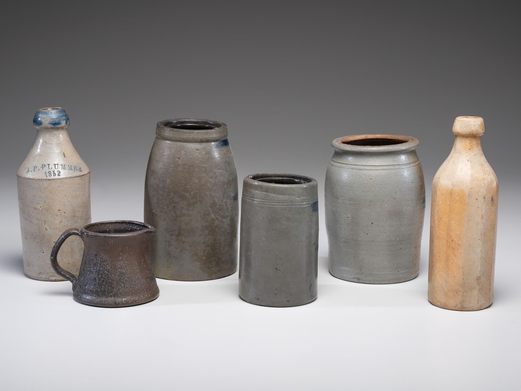 Five Stoneware Bottles and Canning Jars