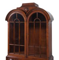A Pair of George II Style Mahogany Bookcases on Stands