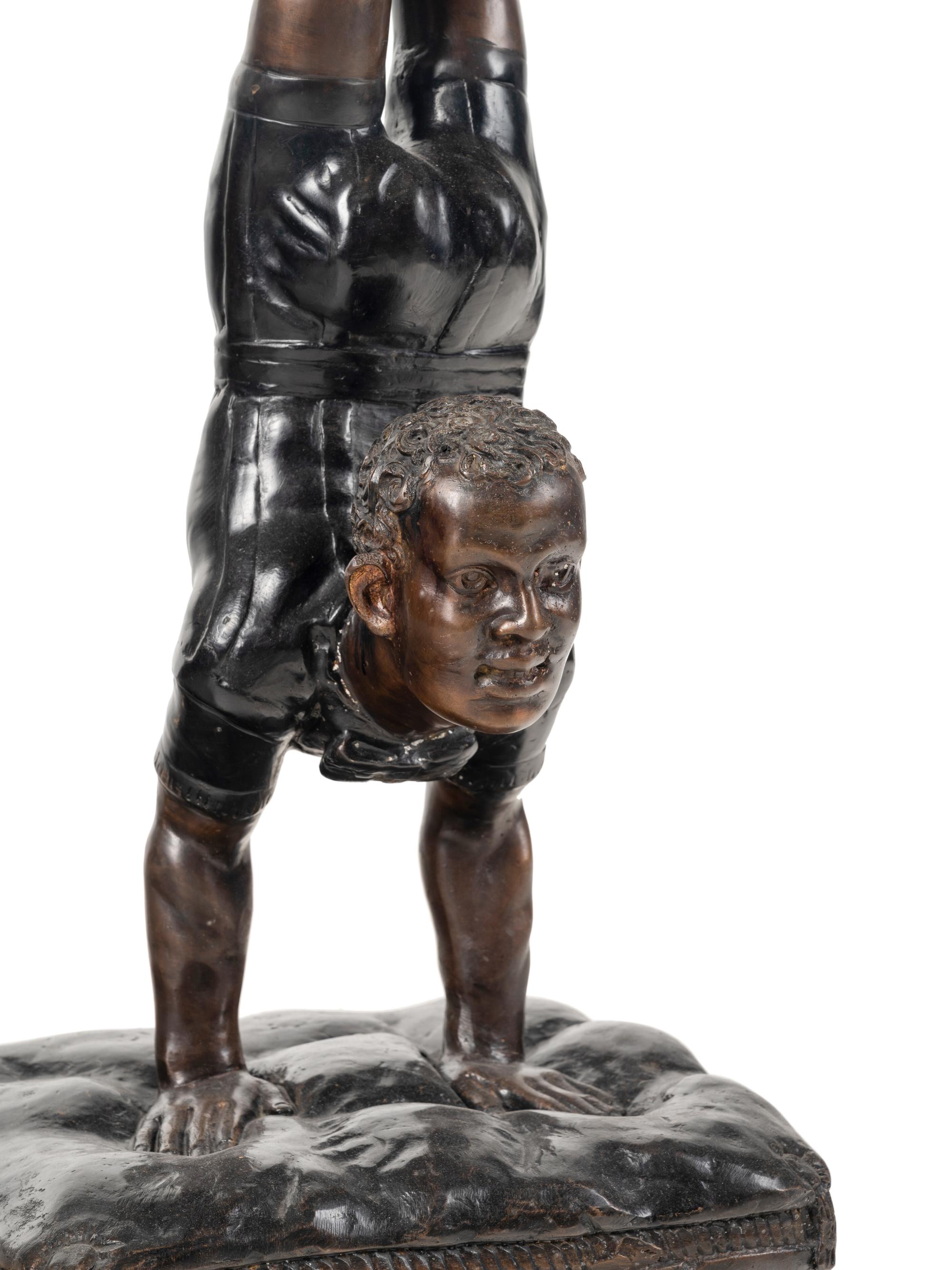 A Bronze Acrobat-Form Pedestal