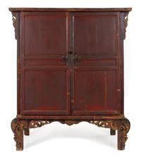 A Large Chinese Red Lacquered Softwood Cabinet Height 72 1/2 x width 61 x depth 25 3/4 inches. — LATE 19TH/20TH CENTURY