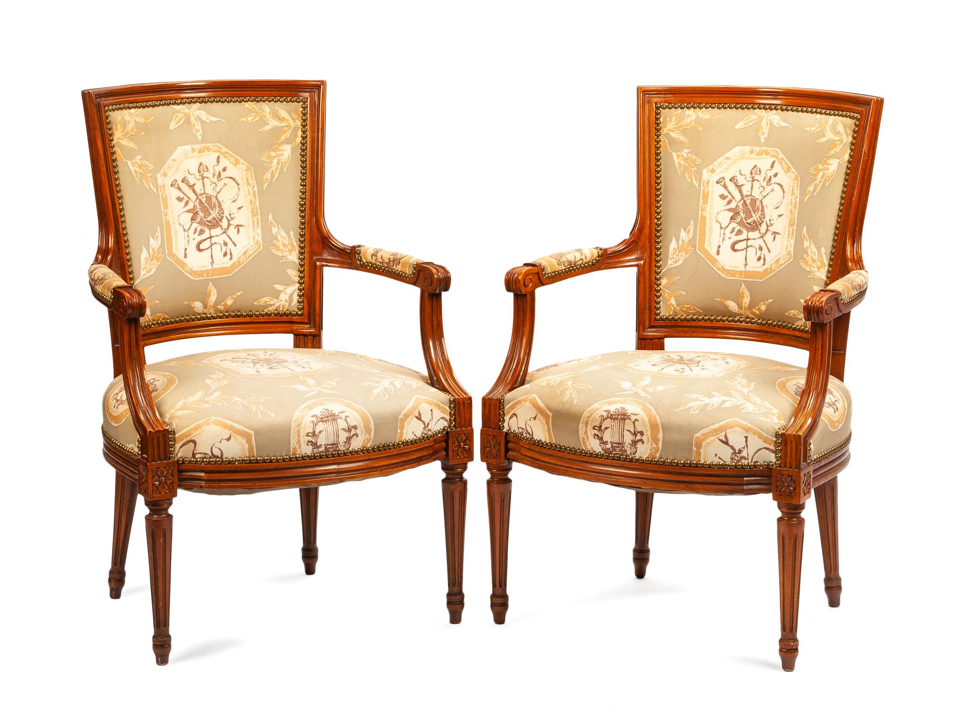 A Pair of Neoclassical Walnut Armchairs Height 34 inches. — 19TH CENTURY