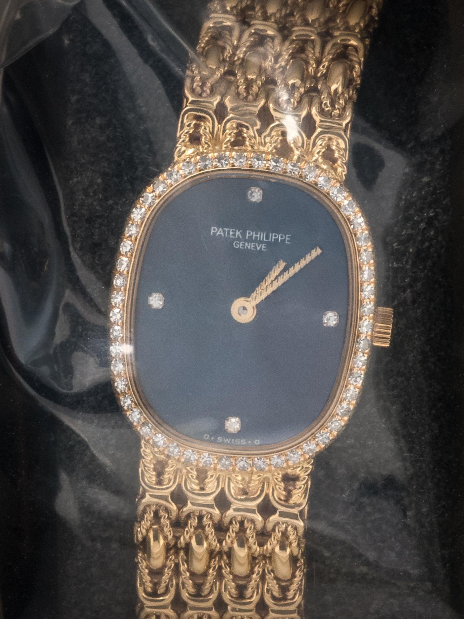 PATEK PHILIPPE, 18K YELLOW GOLD AND DIAMOND REF. 4698/1J 'ELLIPSE' WRISTWATCH