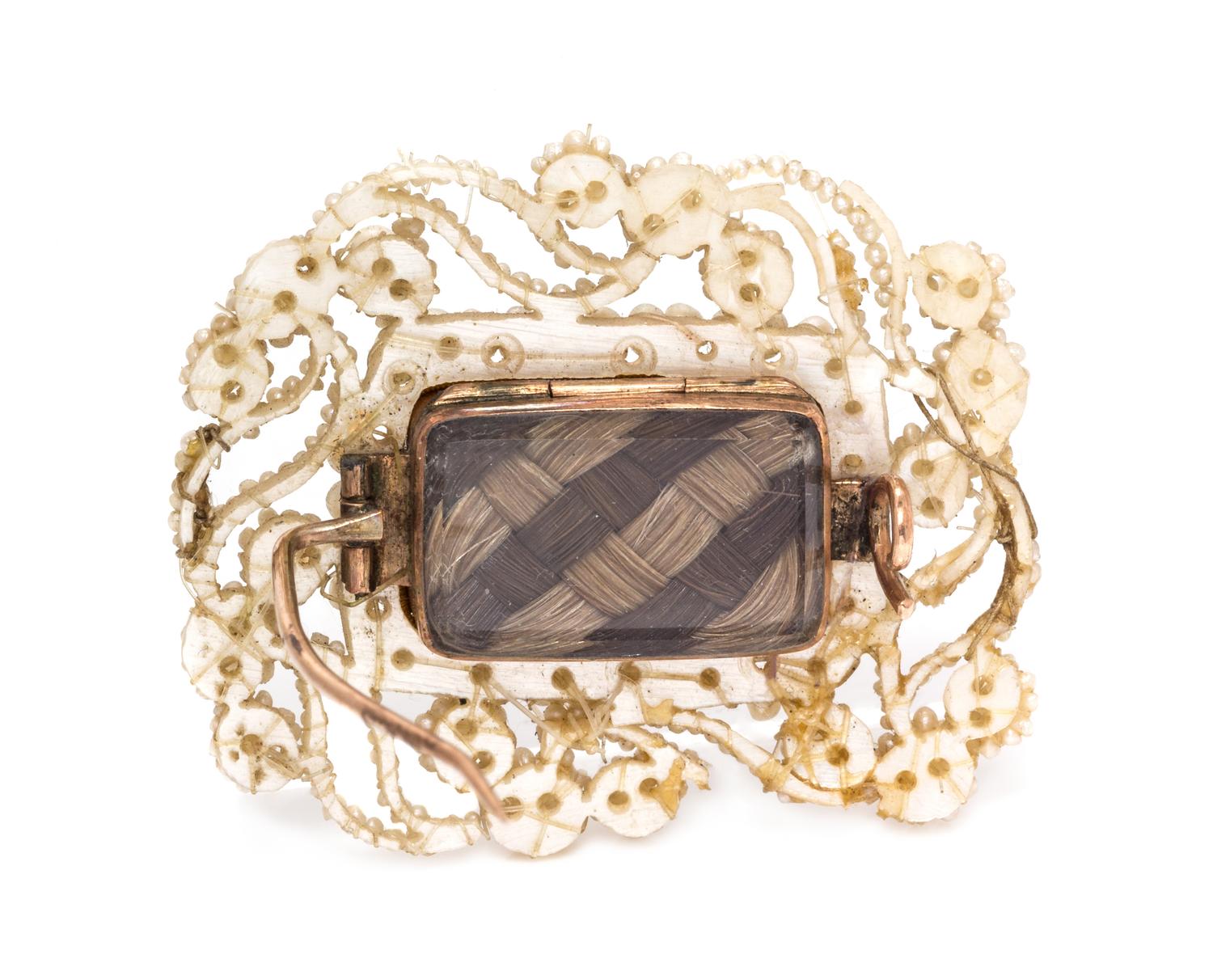 A Georgian Rose Gold, Seed Pearl and Mother-of-Pearl Lover's Eye Brooch, 4.55 dwts.