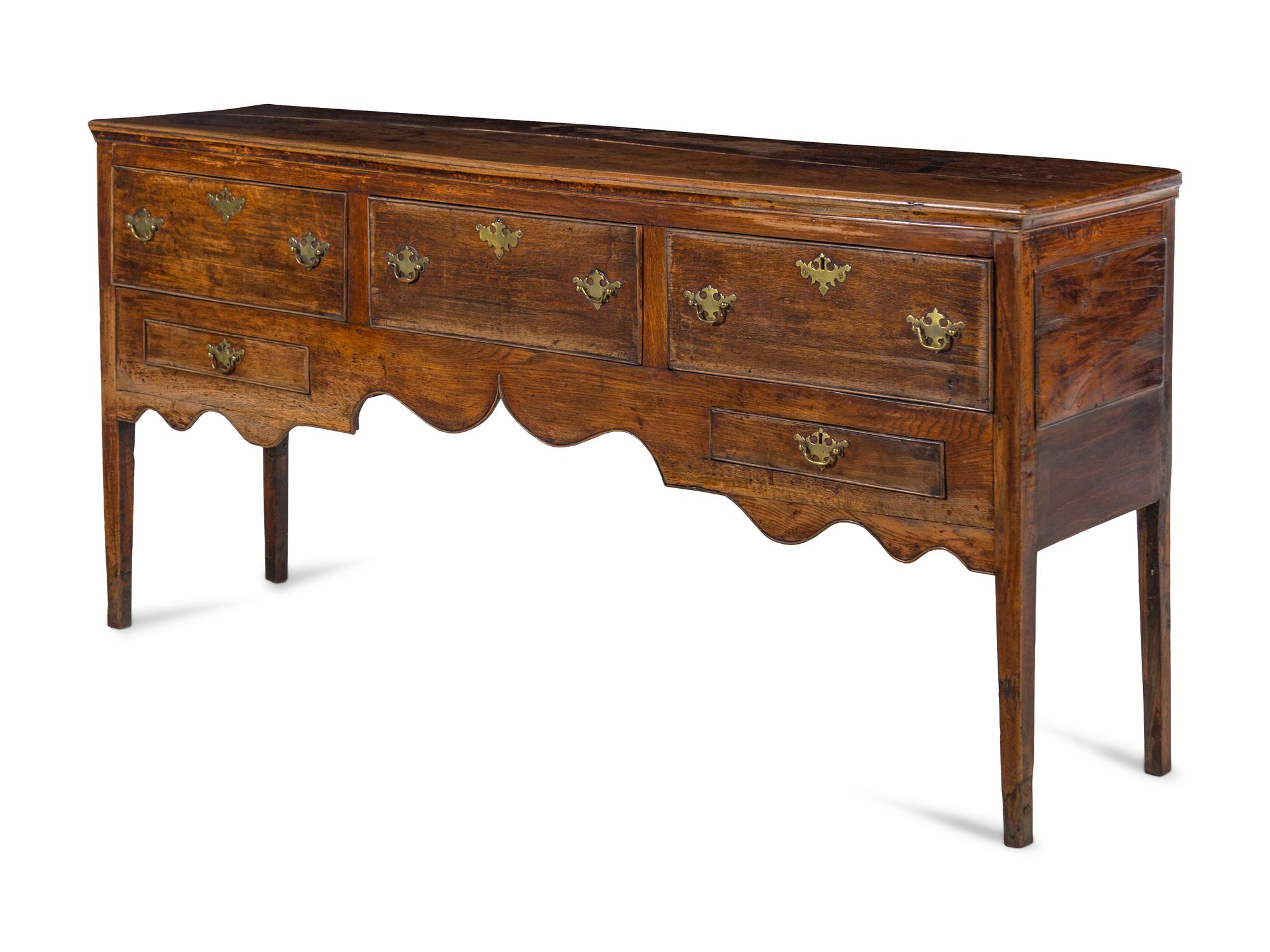 A George III Style Carved Oak Sideboard