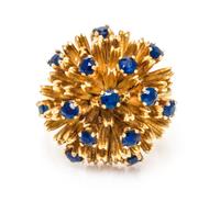 An 18 Karat Yellow Gold and Sapphire Ring, 10.90 dwts.