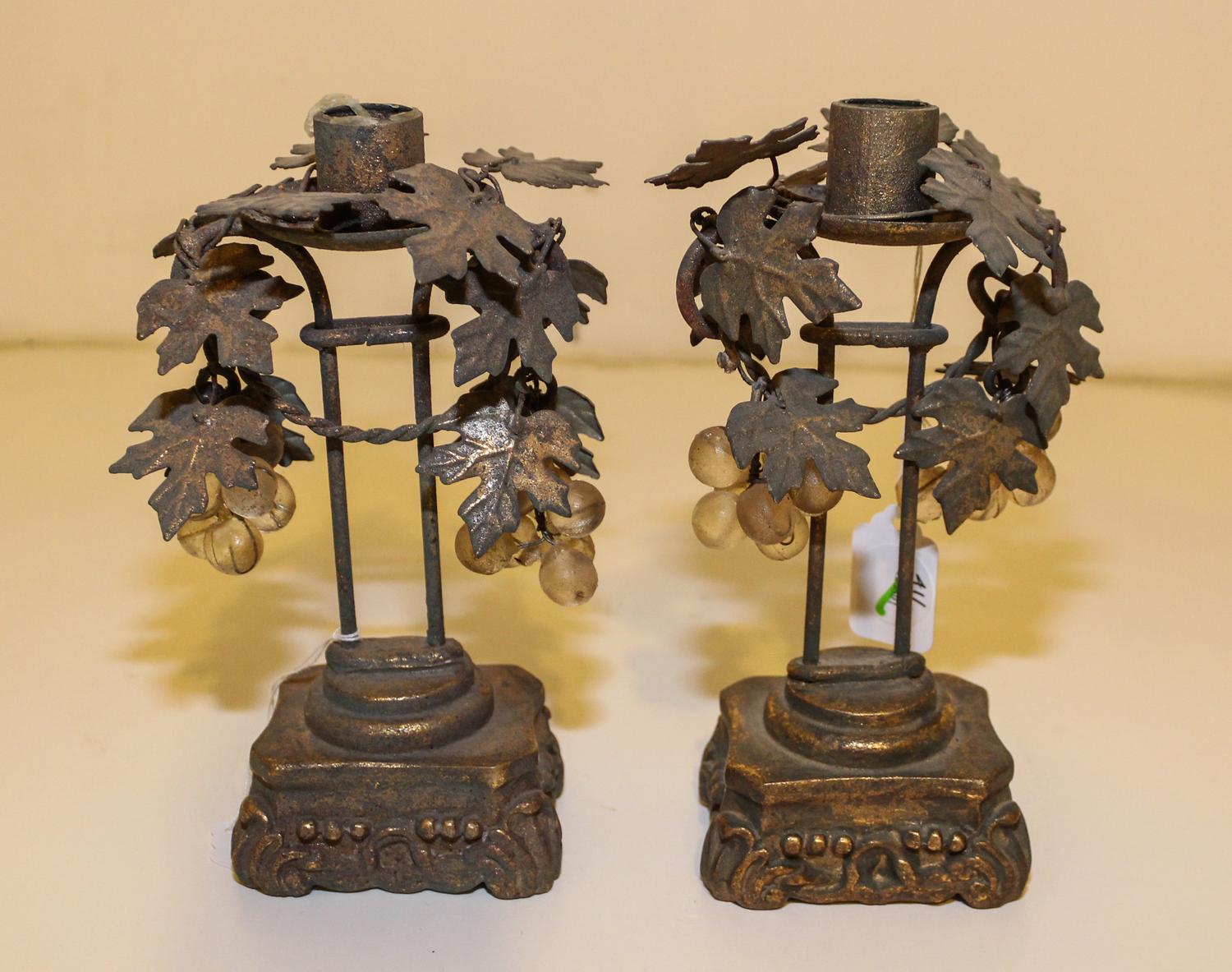 A Pair of Italian Giltwood and Tole Candlesticks. Height 9 inches.