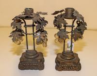 A Pair of Italian Giltwood and Tole Candlesticks. Height 9 inches.