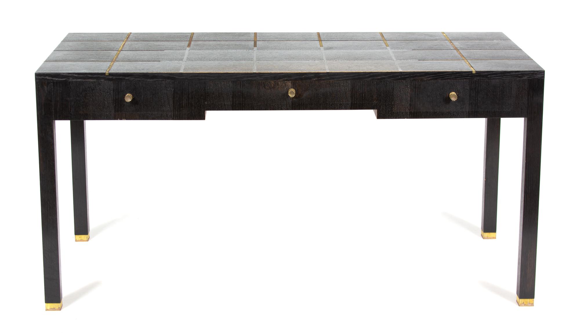 A Contemporary Bronze Inlaid Ebonized Writing Desk Height 30 x width 48 x depth 28 inches. — LOUIS CANE, PARIS, 20TH CENTURY