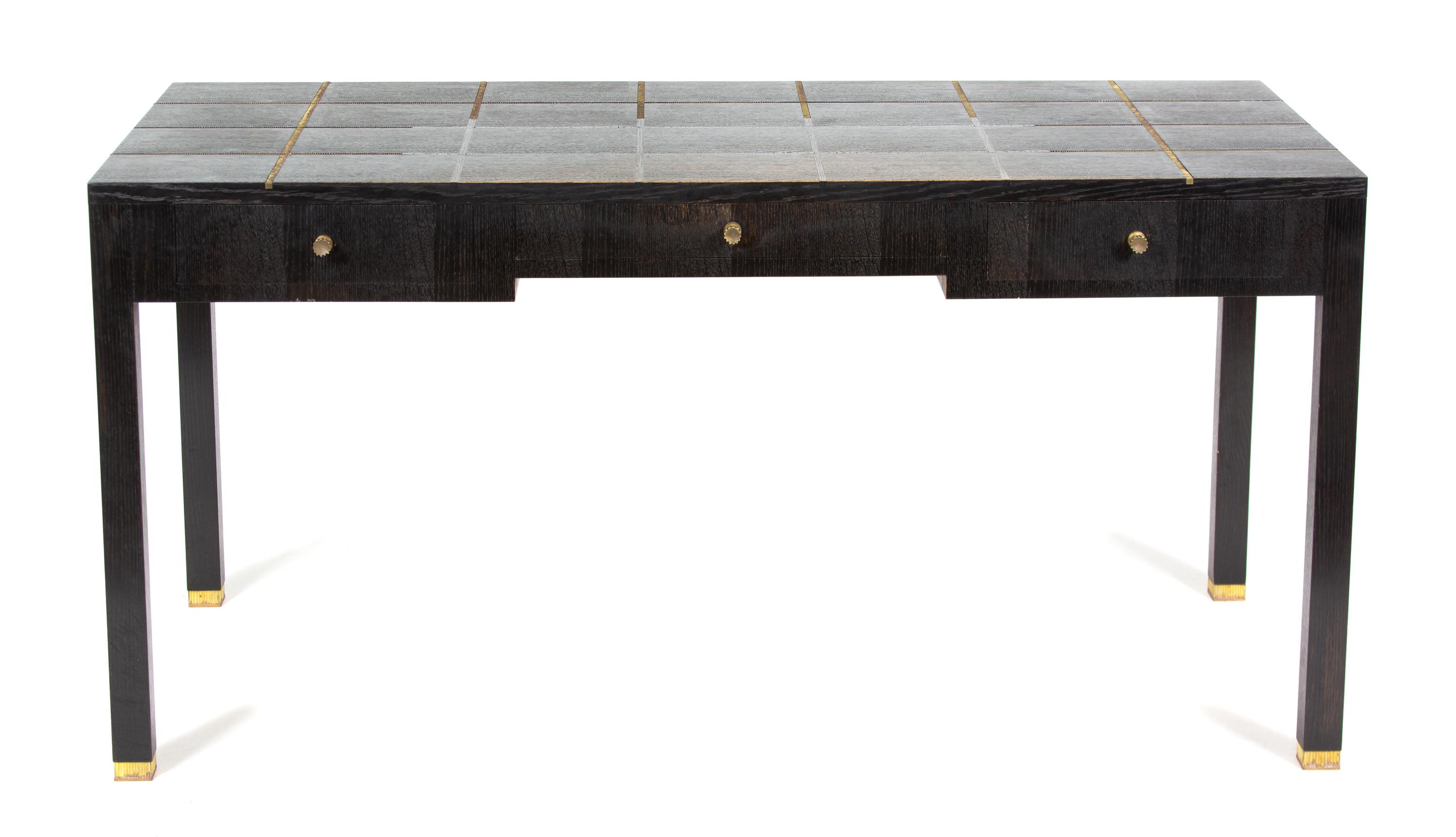 A Contemporary Bronze Inlaid Ebonized Writing Desk Height 30 x width 48 x depth 28 inches. — LOUIS CANE, PARIS, 20TH CENTURY