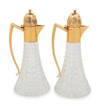 A Pair of English Silver-Gilt Mounted Cut Glass Decanters