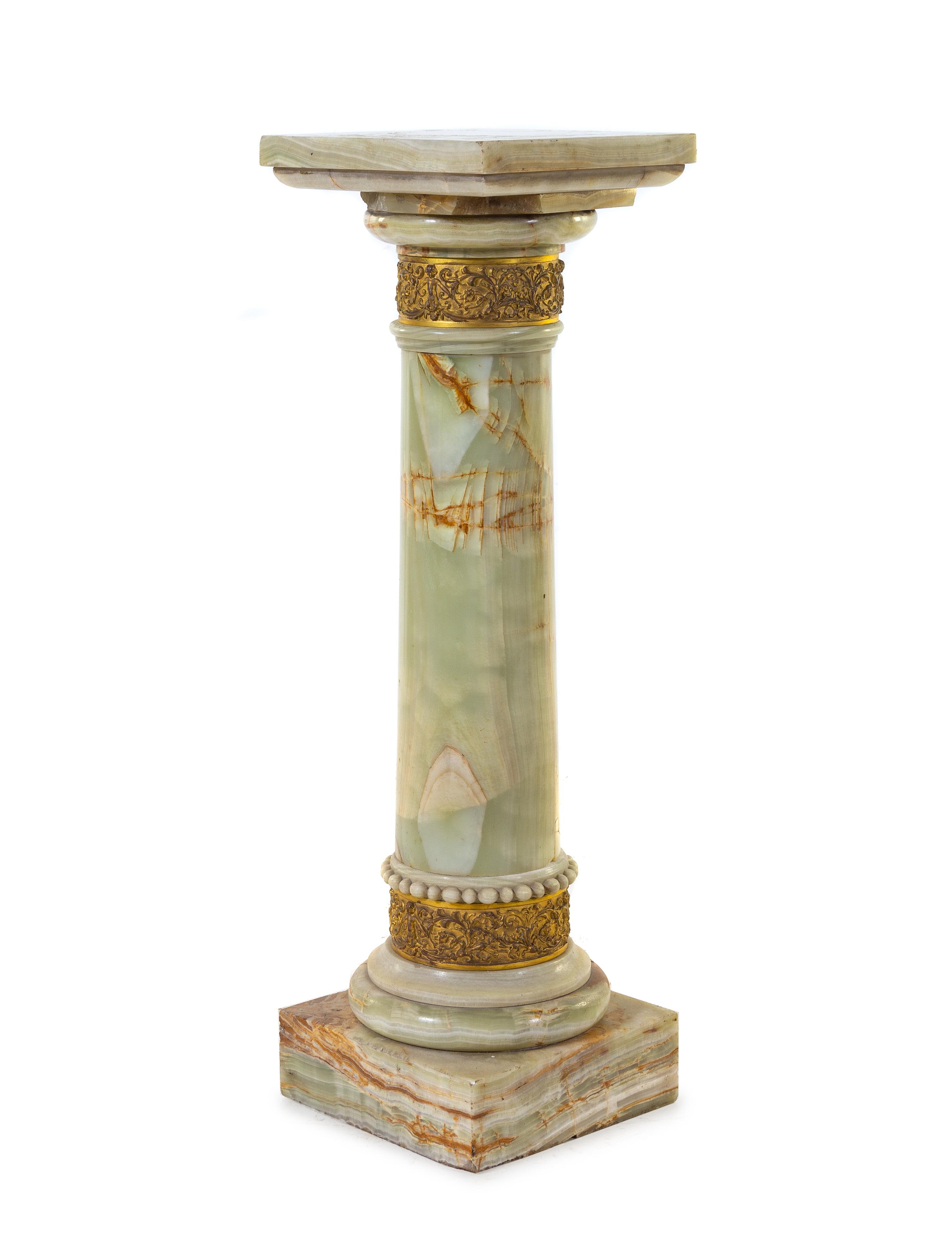 A Continental Gilt Bronze Mounted Onyx Pedestal