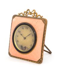 A German Enameled Travel Clock, L.S. Mayer Height 3 1/8 inches.