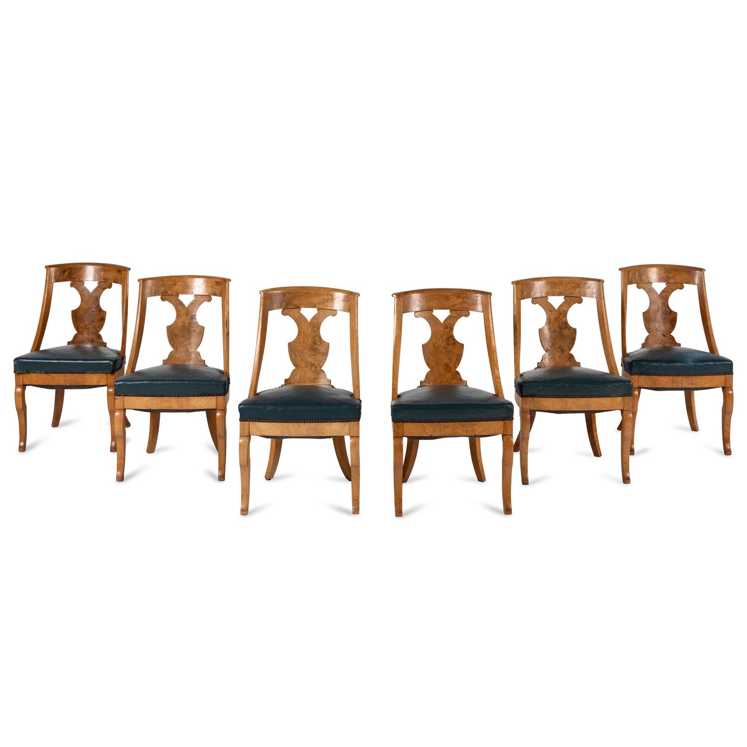 A Set of Six German or Austrian Walnut Dining Chairs