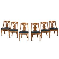 A Set of Six German or Austrian Walnut Dining Chairs