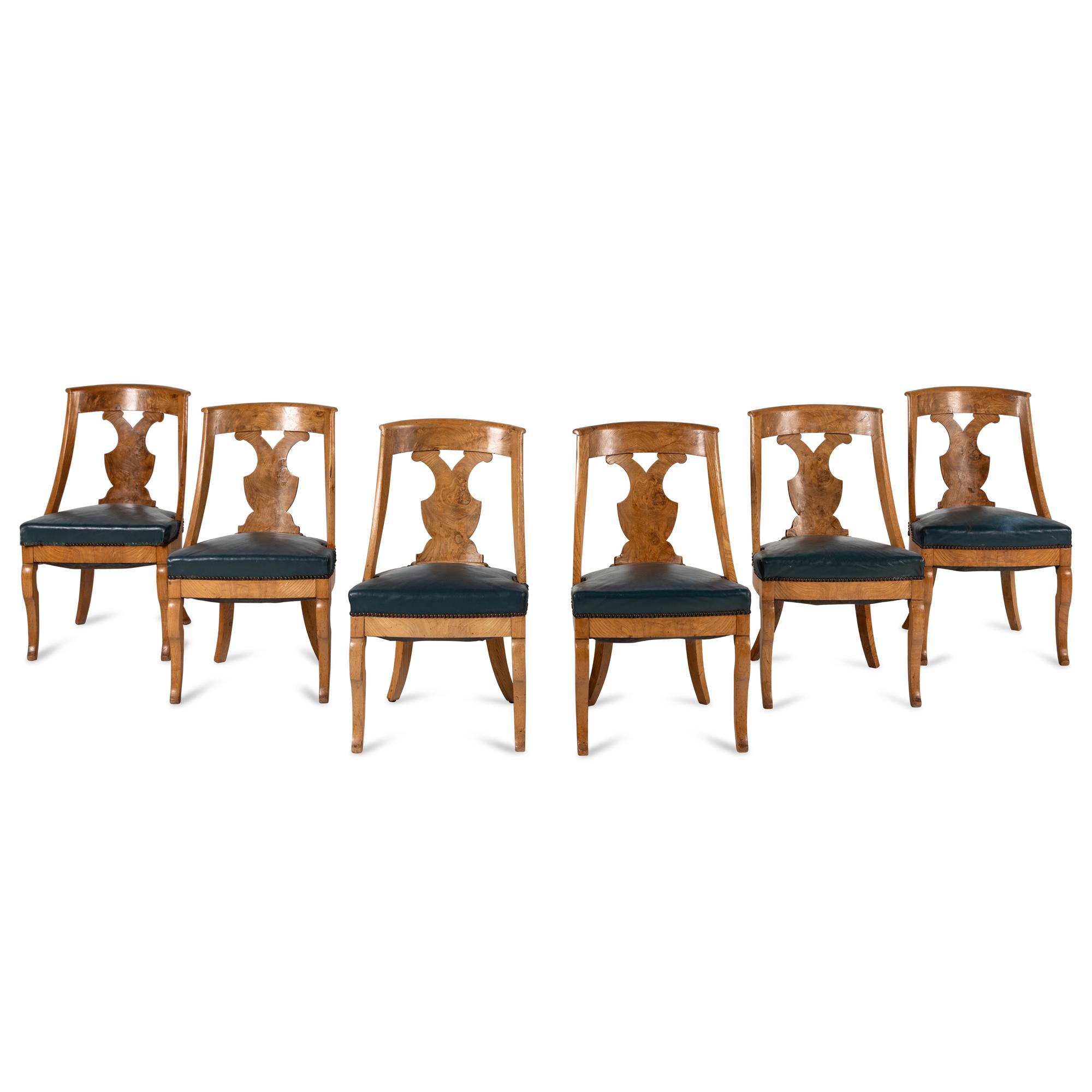 A Set of Six German or Austrian Walnut Dining Chairs