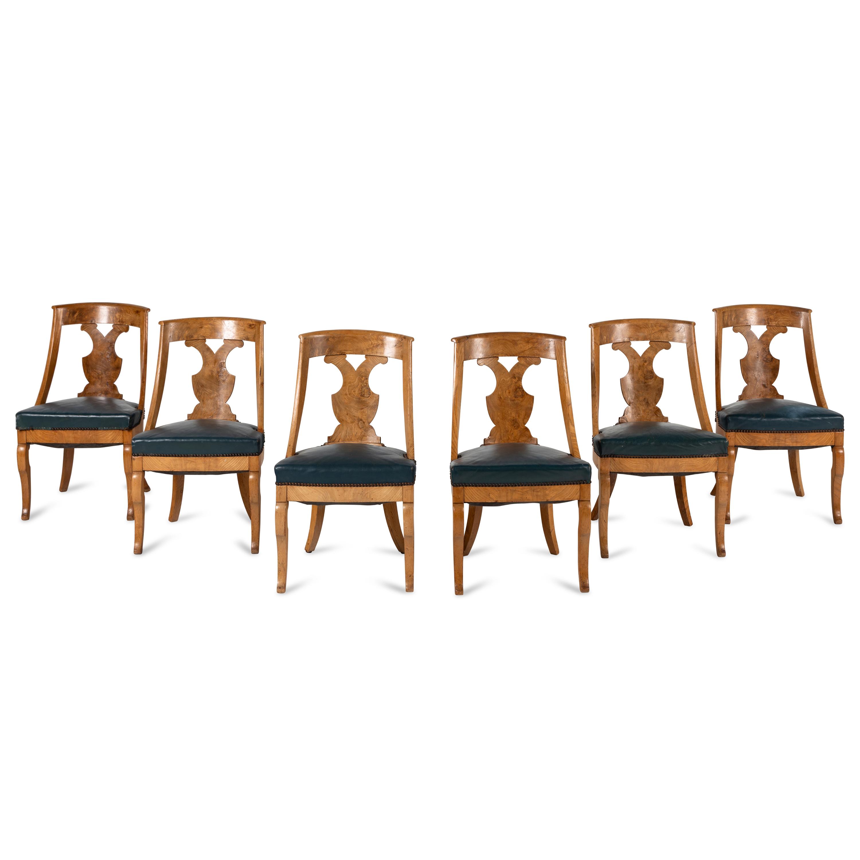 A Set of Six German or Austrian Walnut Dining Chairs