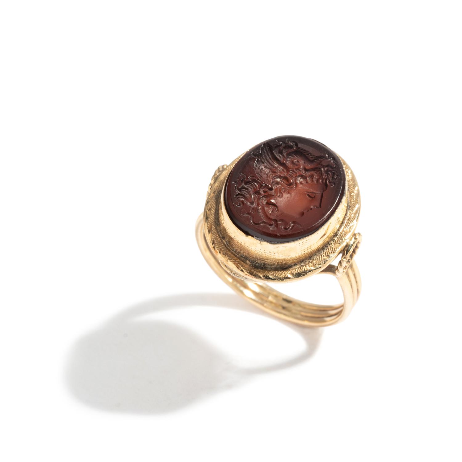 A Neoclassical Gold and Carnelian Finger Ring with a Head of Medusa