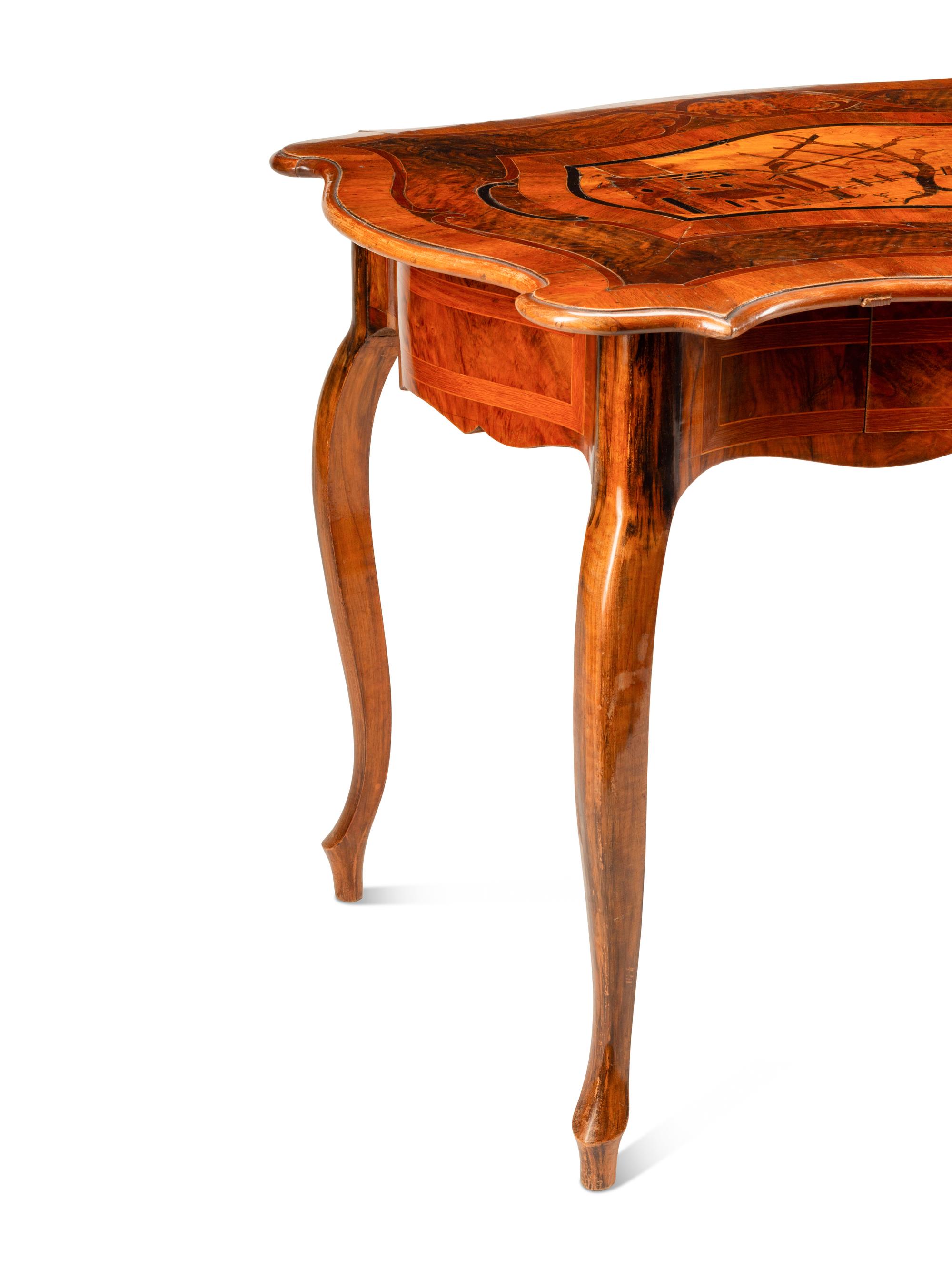 A Continental Walnut and Marquetry Table