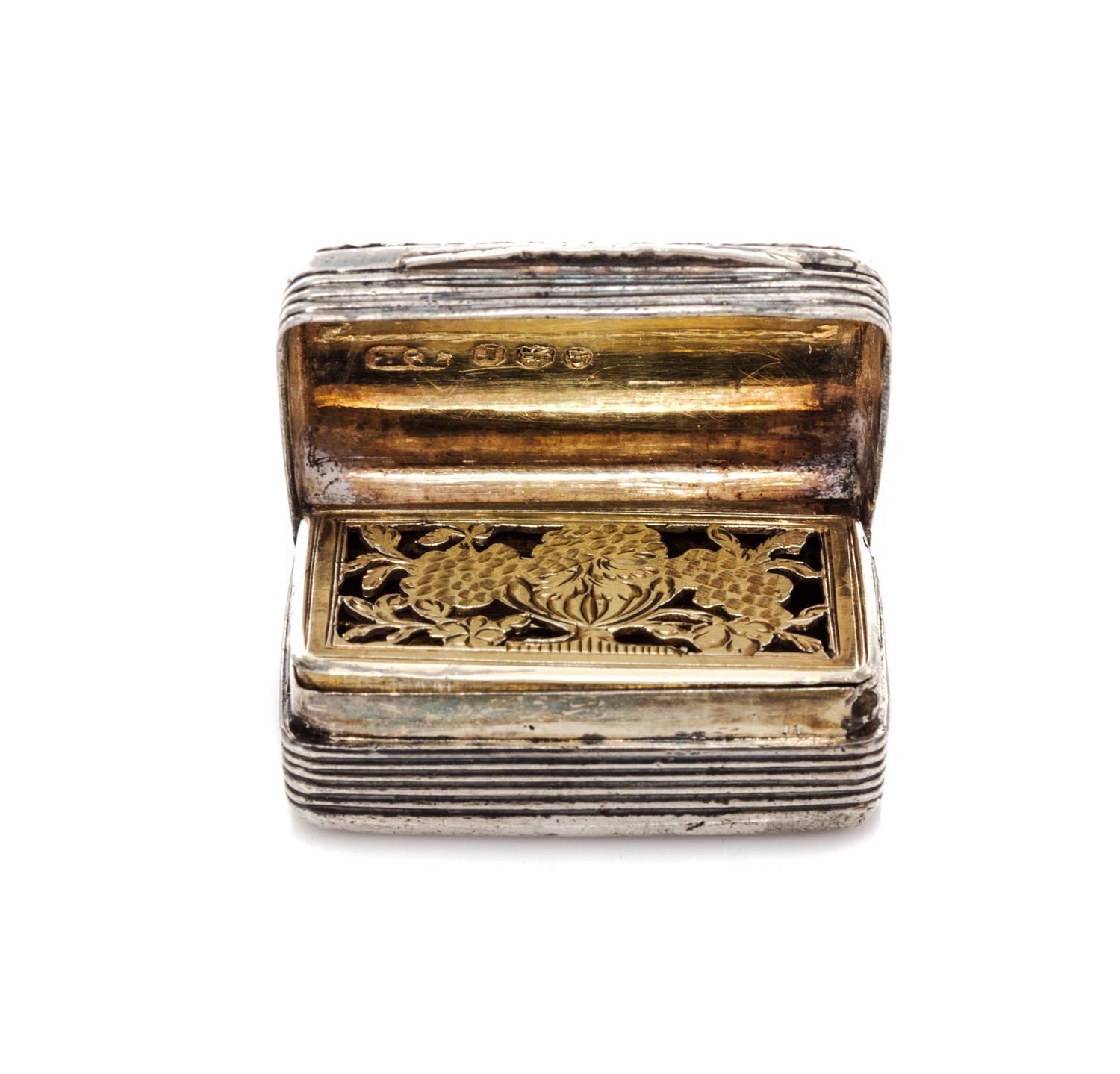 A George III Silver Vinaigrette, Thomas Evans, London, 1792, having a foliate decorated border opening to an interior screen decorated