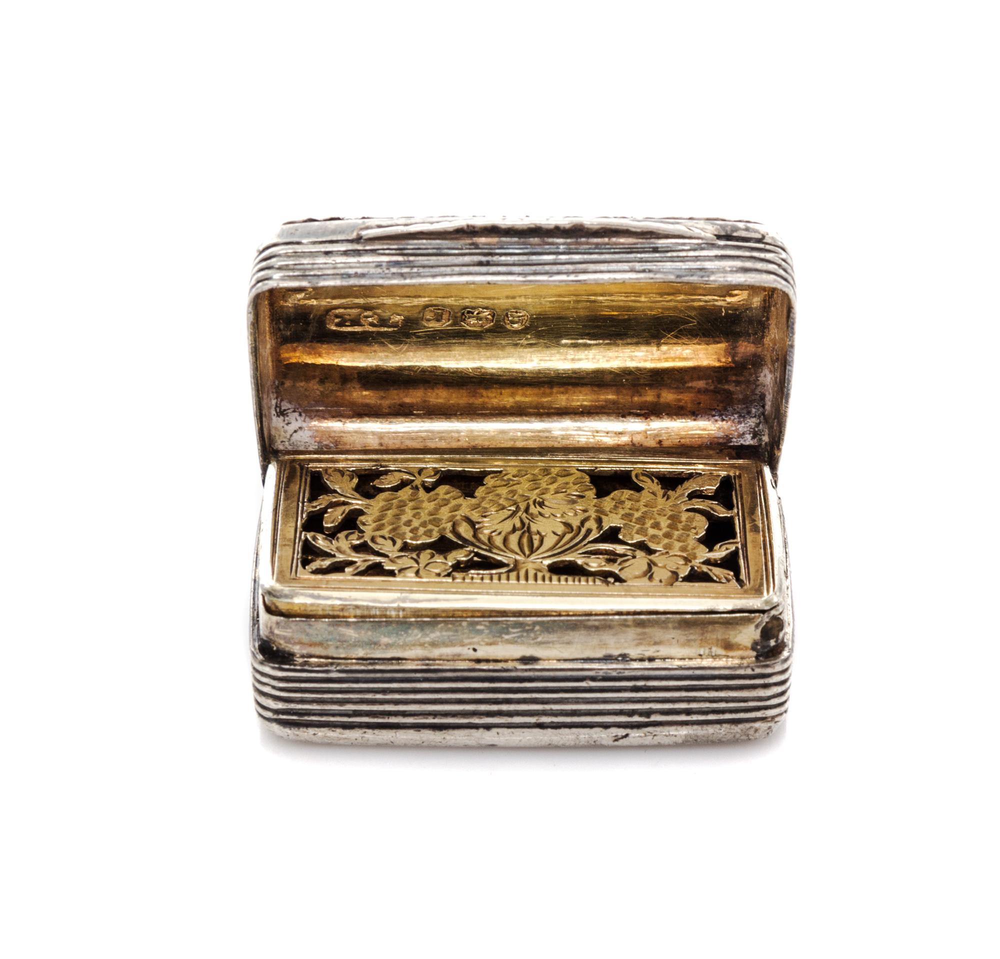 A George III Silver Vinaigrette, Thomas Evans, London, 1792, having a foliate decorated border opening to an interior screen decorated