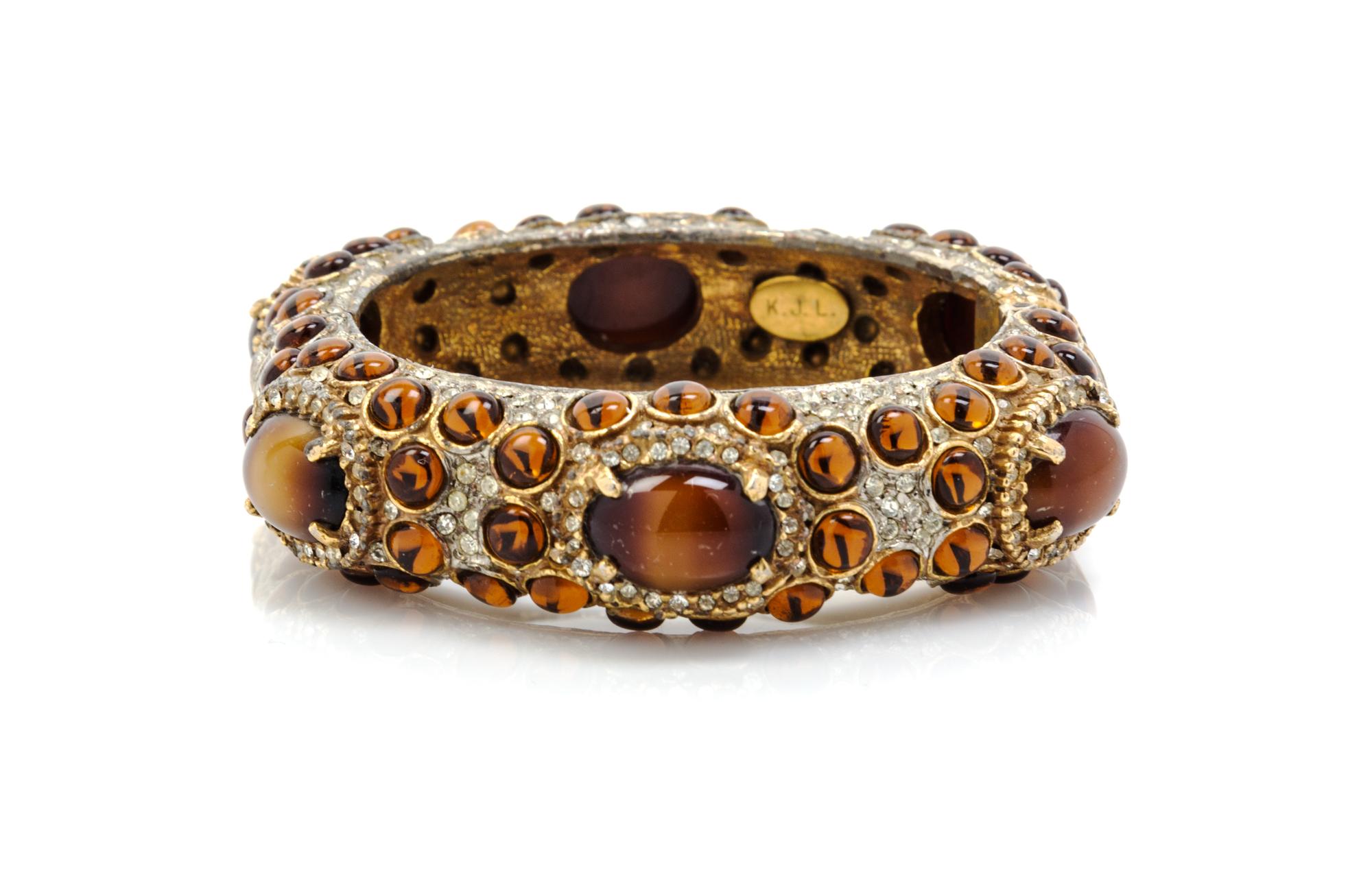 A Kenneth Jay Lane Faux Amber Cabochon Hinged Bracelet,