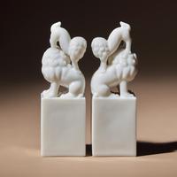 A Pair of Chinese Blanc-de-Chine Porcelain Fu Lion Seals, 18th/19th Century — 清中期 德化白瓷太獅少獅印章一對