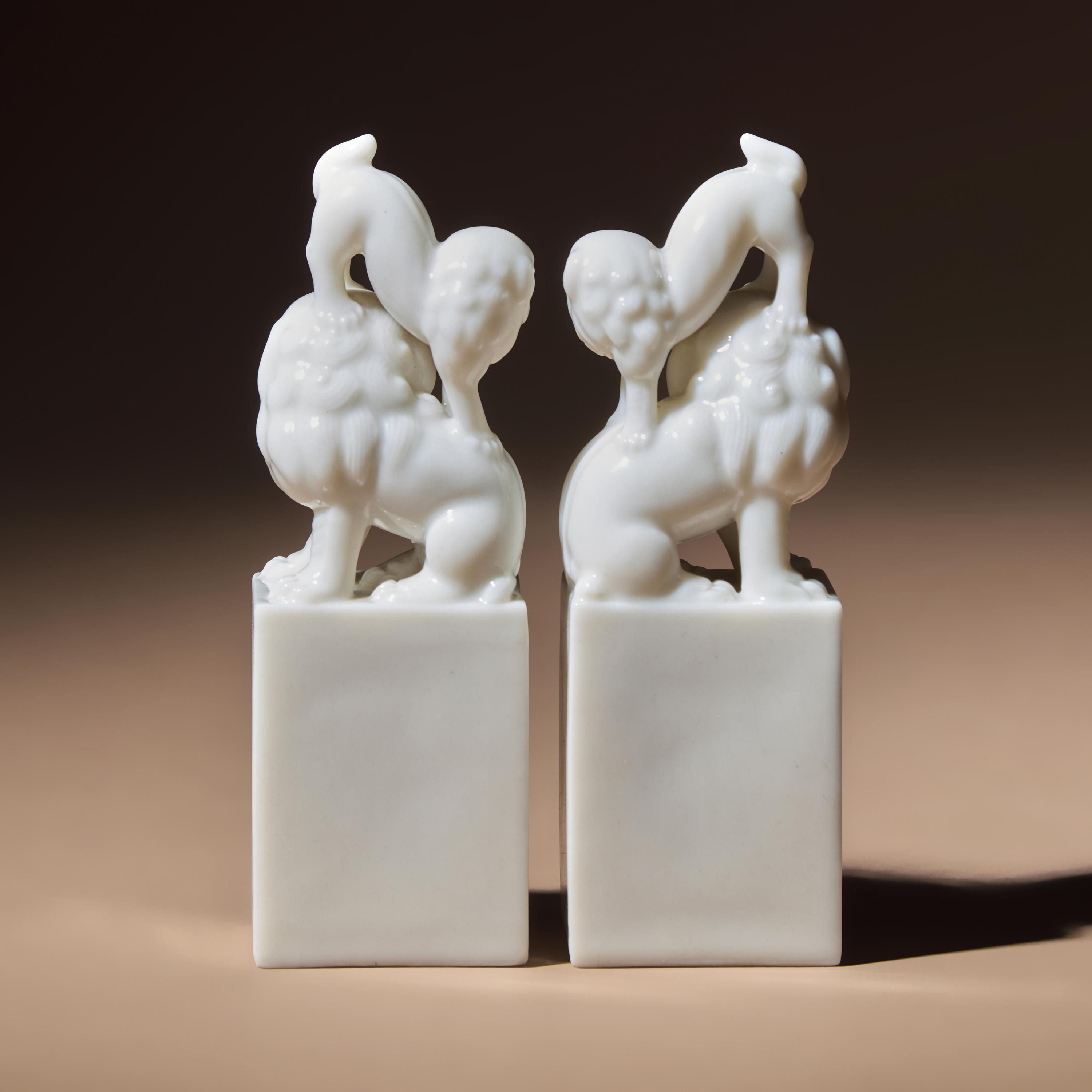 A Pair of Chinese Blanc-de-Chine Porcelain Fu Lion Seals, 18th/19th Century — 清中期 德化白瓷太獅少獅印章一對