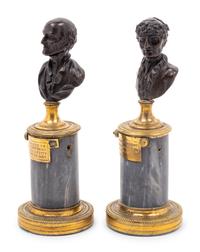 A Pair of French Bronze and Marble Small Busts of Voltaire and Rousseau