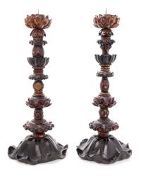 A Pair of Zelkova Wood Candlesticks Height of each 25 1/2 inches.