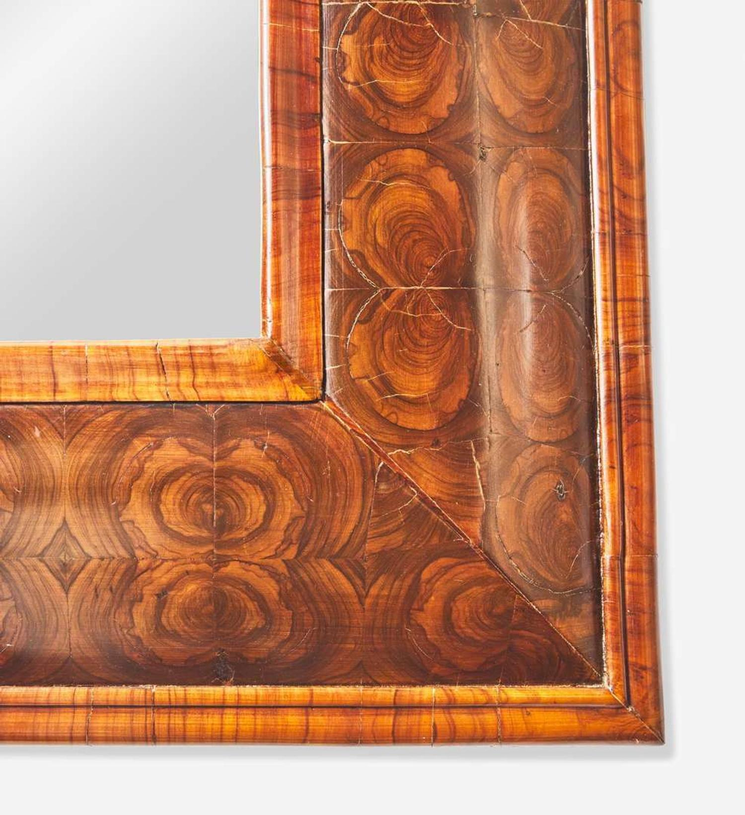 A William & Mary burl walnut veneered mirror early 18th century and later