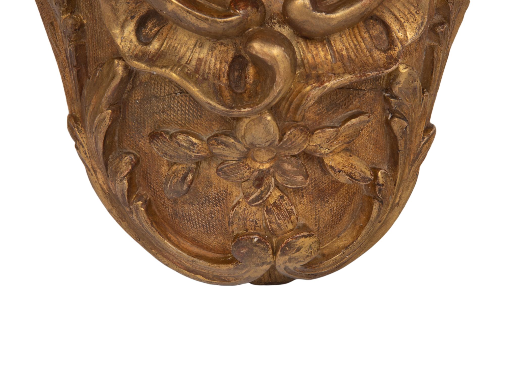A Pair of Continental Giltwood Brackets