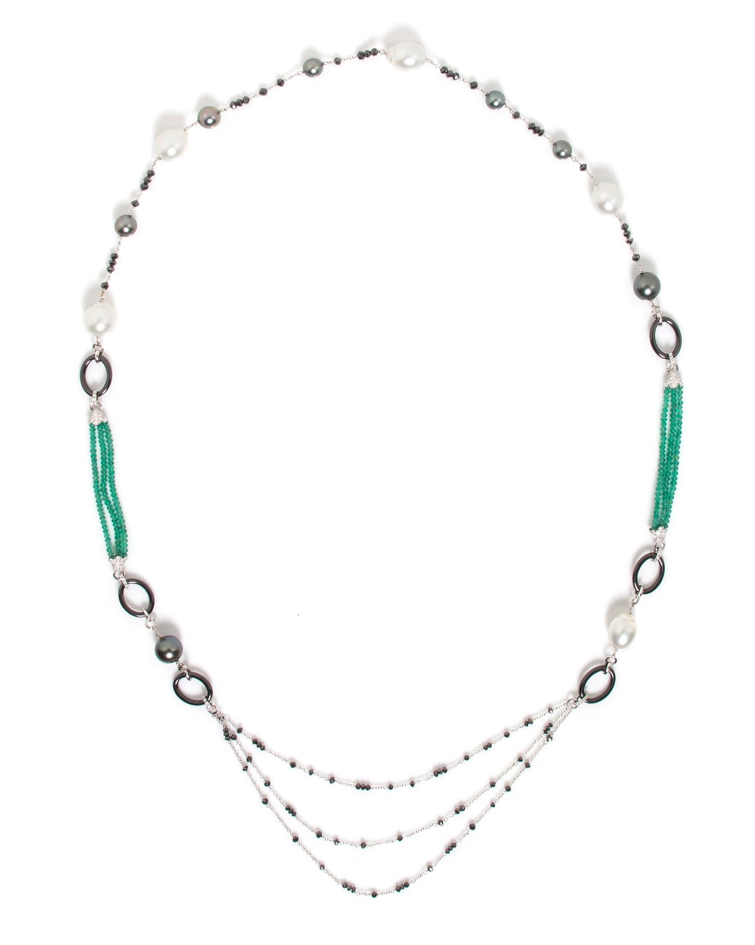 An 18 Karat White Gold, Cultured Pearl, Diamond, Black Diamond, Emerald and Onyx Longchain, 43.10 dwts.