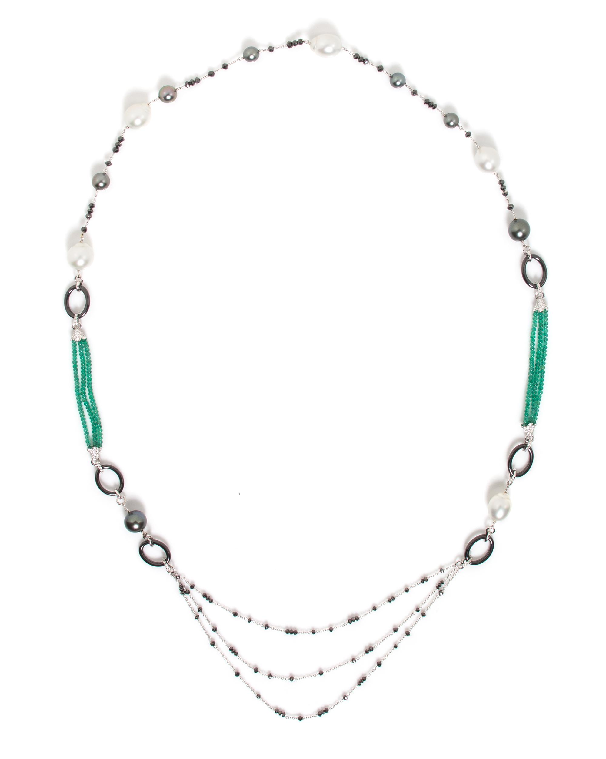 An 18 Karat White Gold, Cultured Pearl, Diamond, Black Diamond, Emerald and Onyx Longchain, 43.10 dwts.