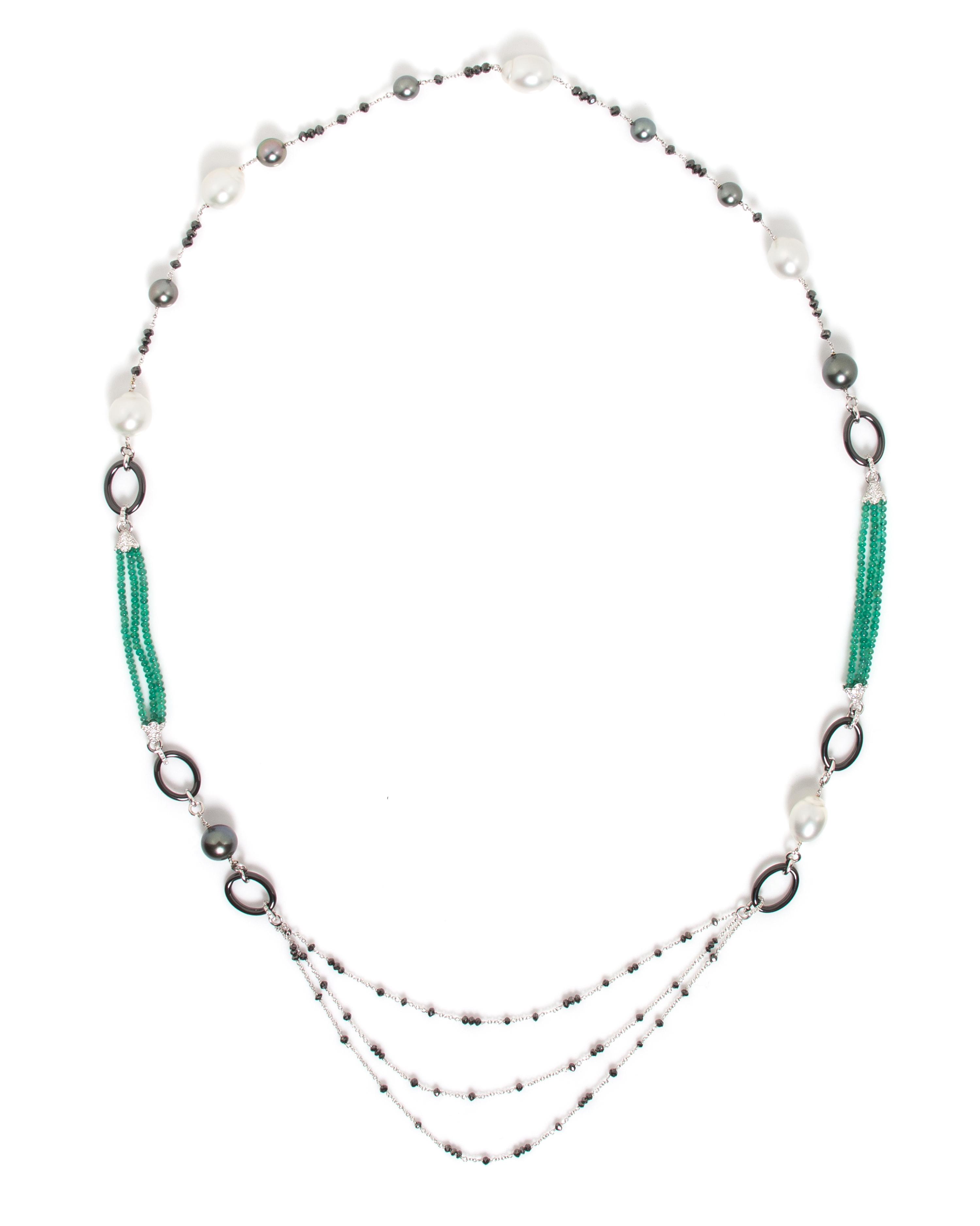 An 18 Karat White Gold, Cultured Pearl, Diamond, Black Diamond, Emerald and Onyx Longchain, 43.10 dwts.