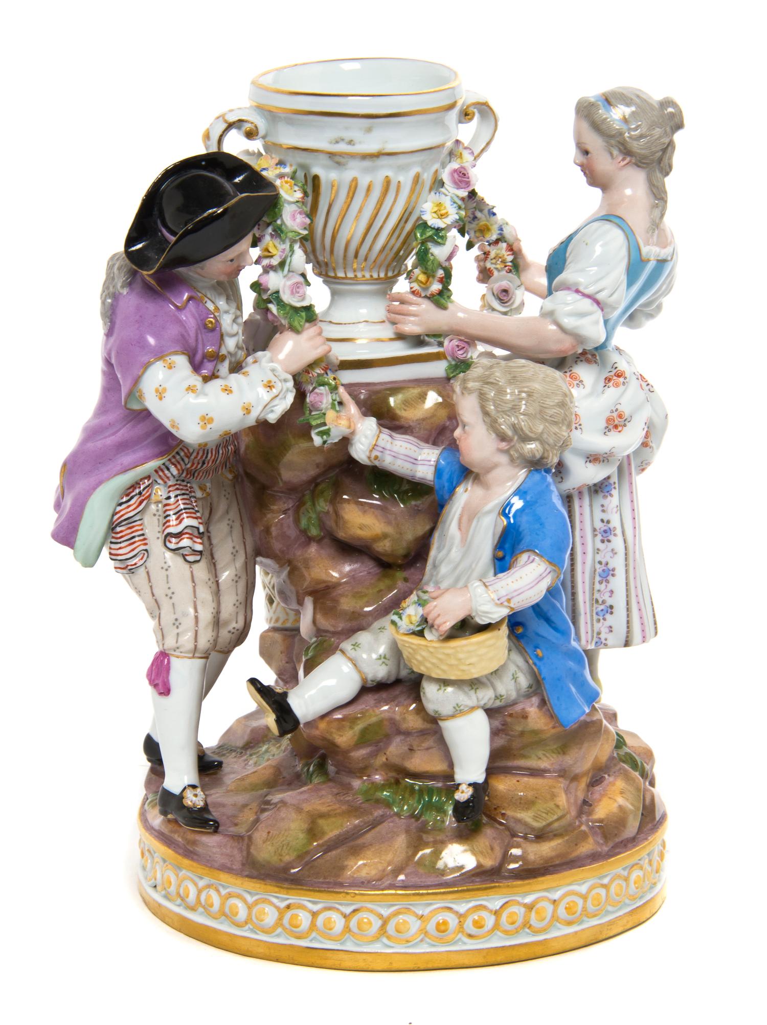 A Meissen Porcelain Figural Group, Height 7 1/2 inches.