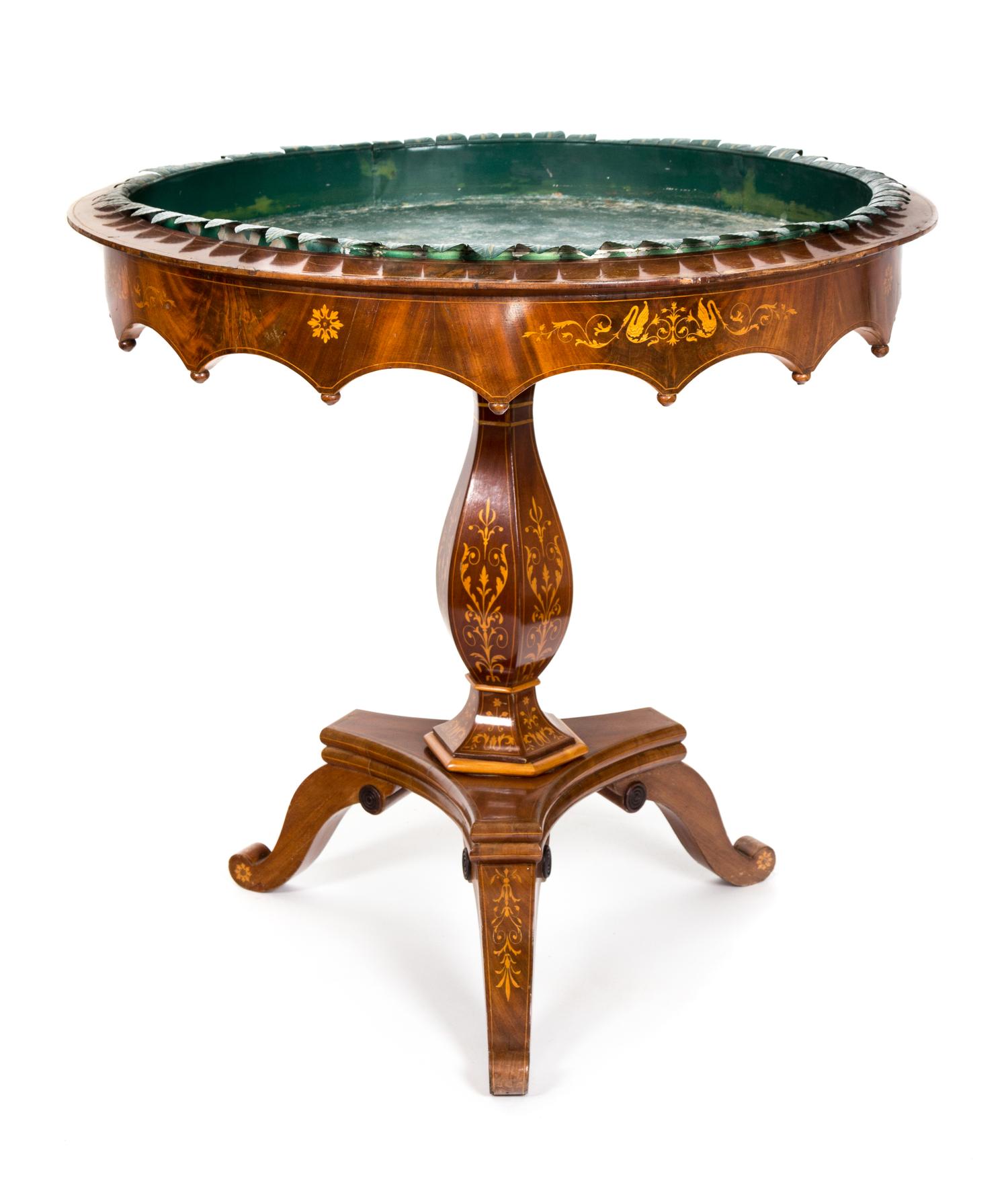 A German Mahogany and Marquetry Jardinière Height 32 x diameter 33 inches. — 19TH CENTURY