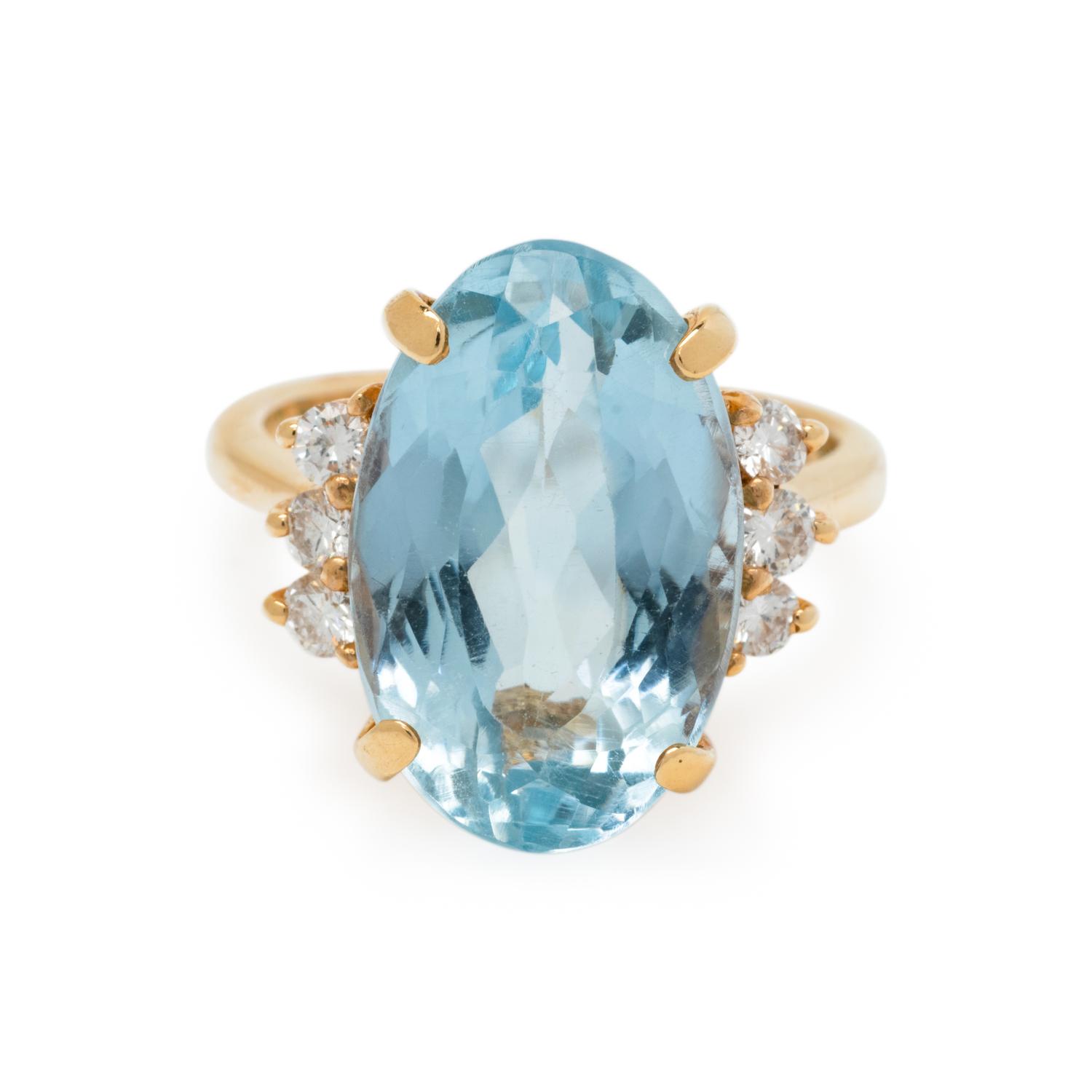 BLUE TOPAZ AND DIAMOND RING