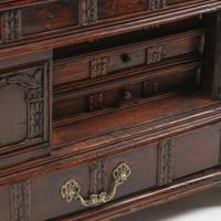 A Continental Carved Walnut Cassone