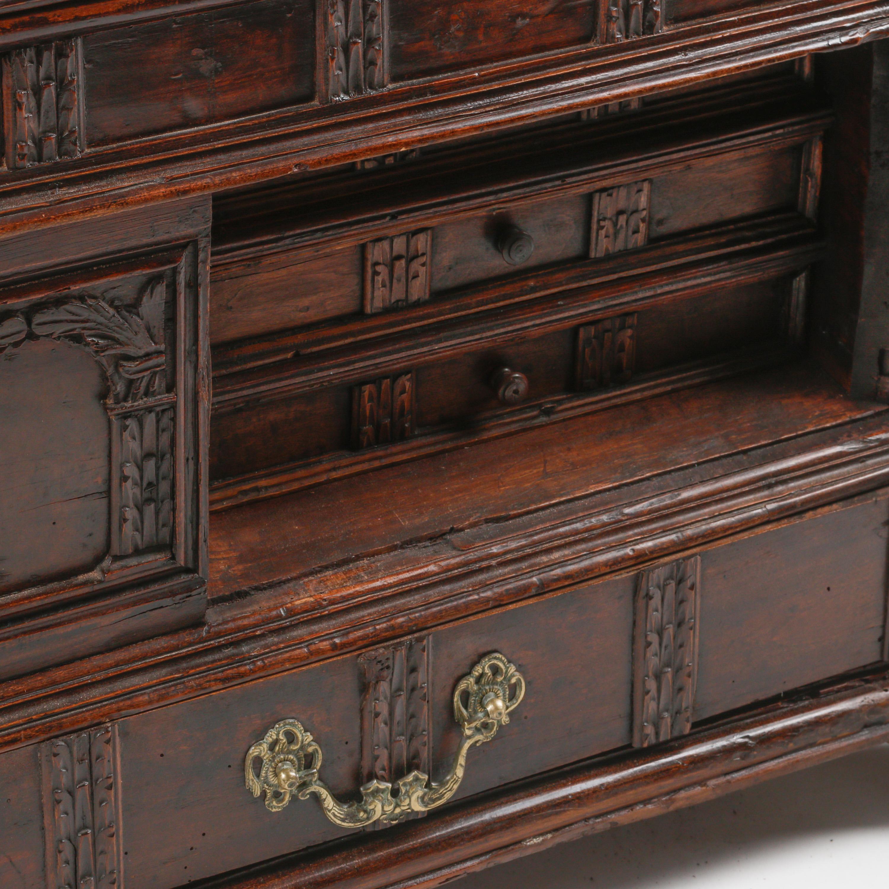 A Continental Carved Walnut Cassone