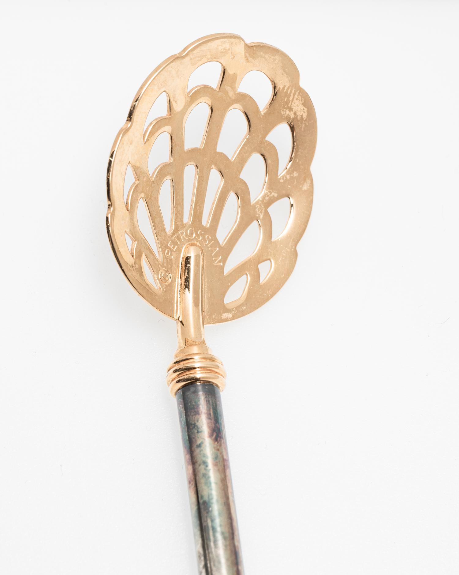A Group of Petrossian Gold- and Silver-Plate Pierced Caviar Spoons